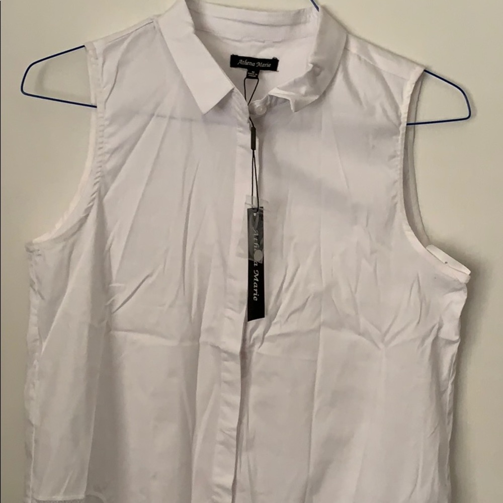 White sleeveless top with sheer embroidered bottom